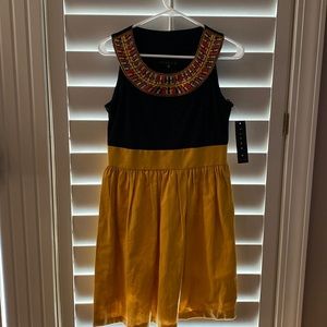 Tiana B. Size 6 black yellow dress